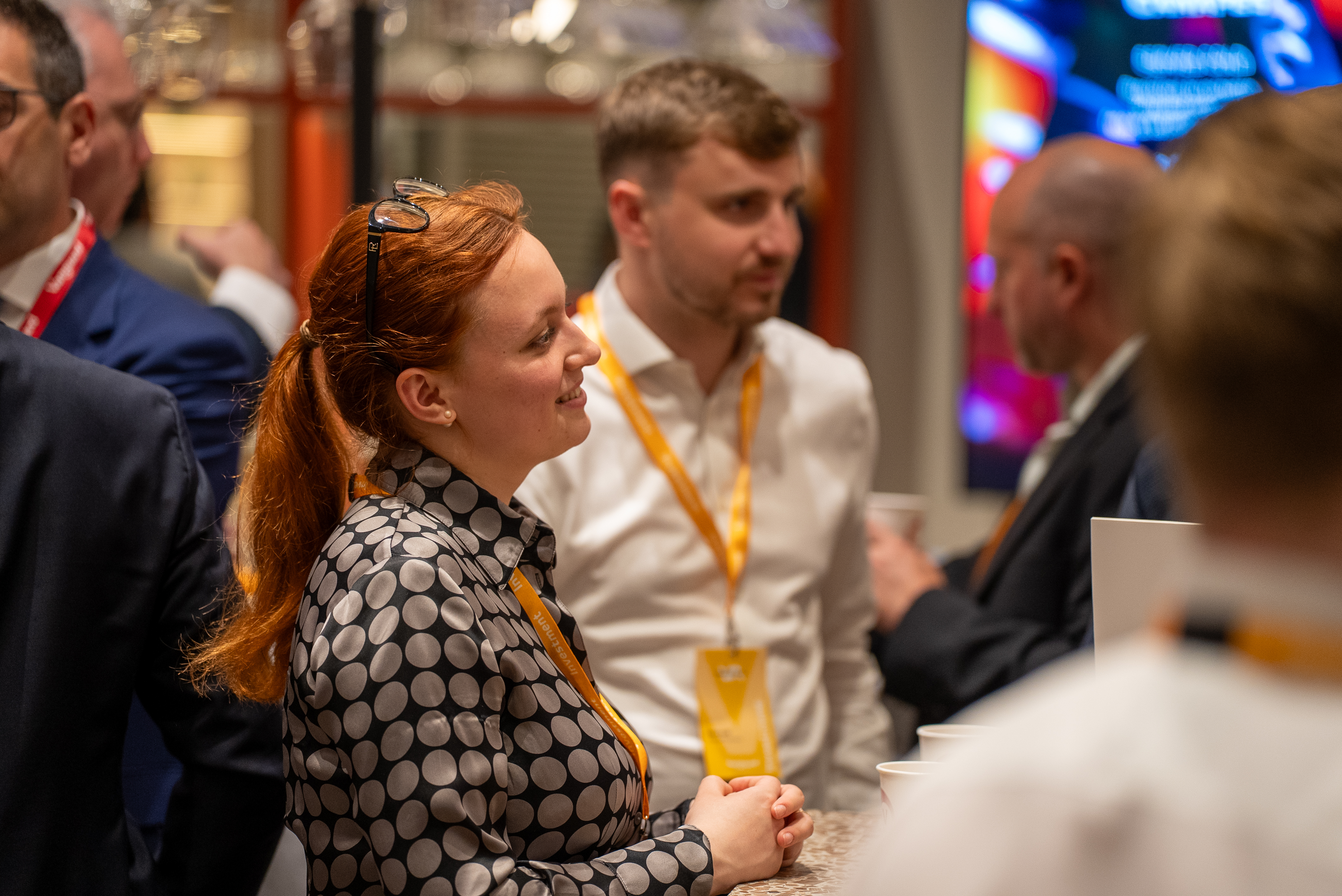 Conference attendees from the investment stream during a break
