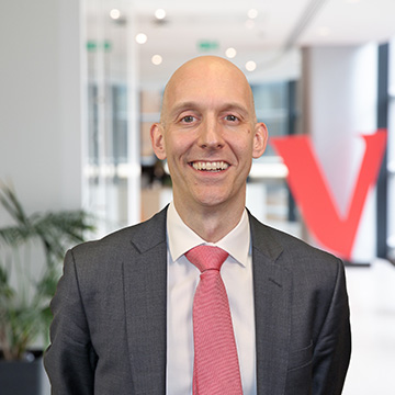 Sebastian Lewis, CFA + ' ' + Senior Specialist in Vanguard’s  Advisory Research Centre