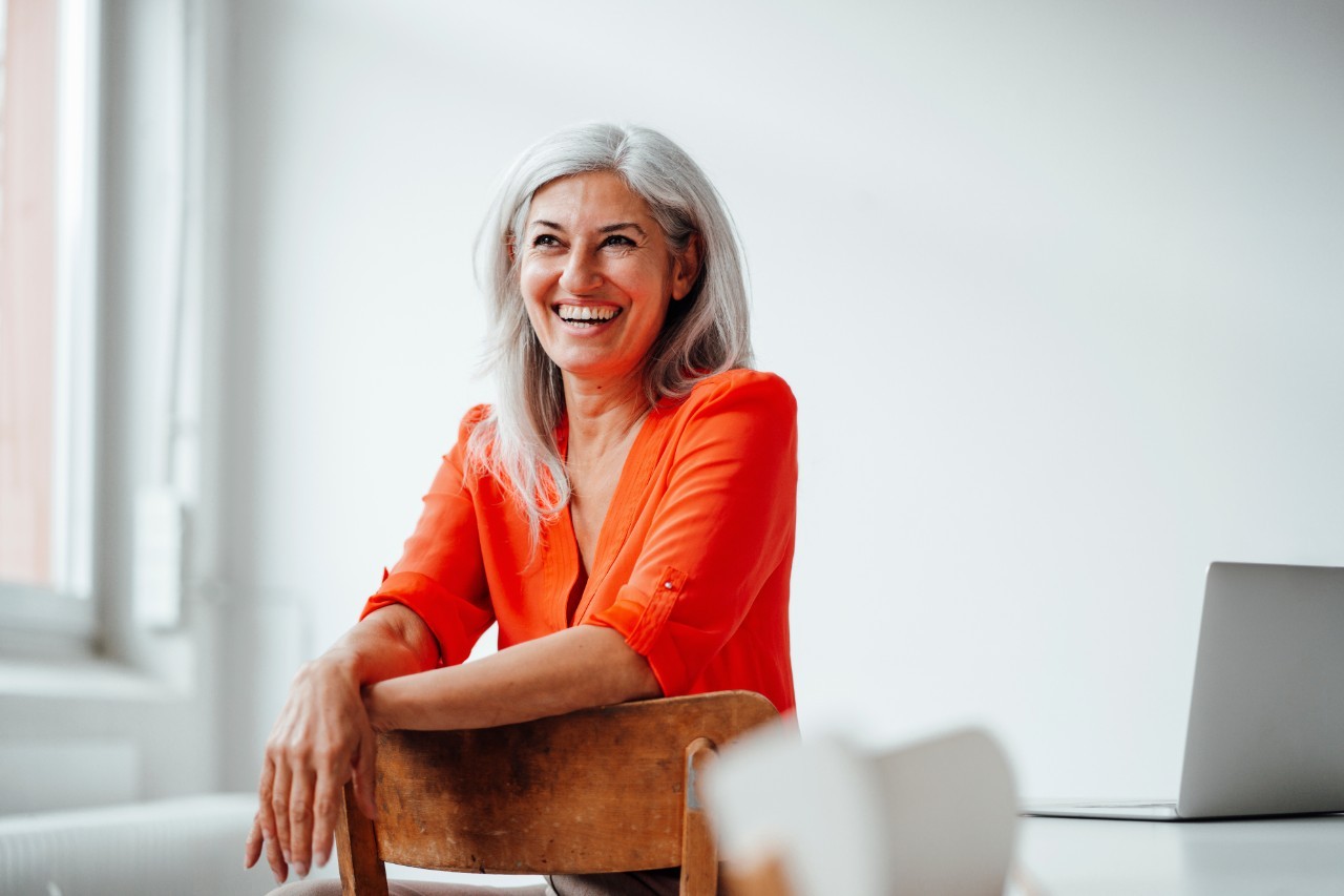 Woman in an orange top